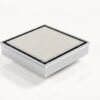 Neston Square Max Tile Insert Grate Stainless Steel Hero Neston Square Max tile insert grate in brushed stainless steel, angled view