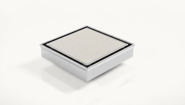 Neston Square Max Tile Insert Grate Stainless Steel Hero Neston Square Max tile insert grate in brushed stainless steel, angled view